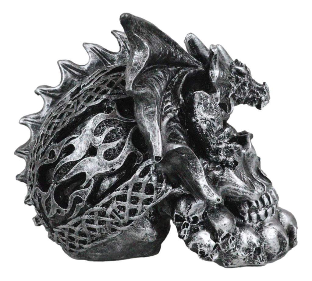 Flying Dragon on Ossuary Morphing Skull with Celtic Tribal Patterns Figurine